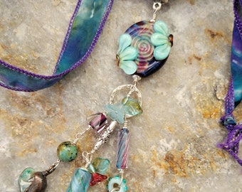 Birdie vestigt alibi! Fringe hanger van Penny Michelle