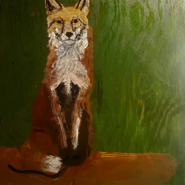 Sitting Red Fox on wood.