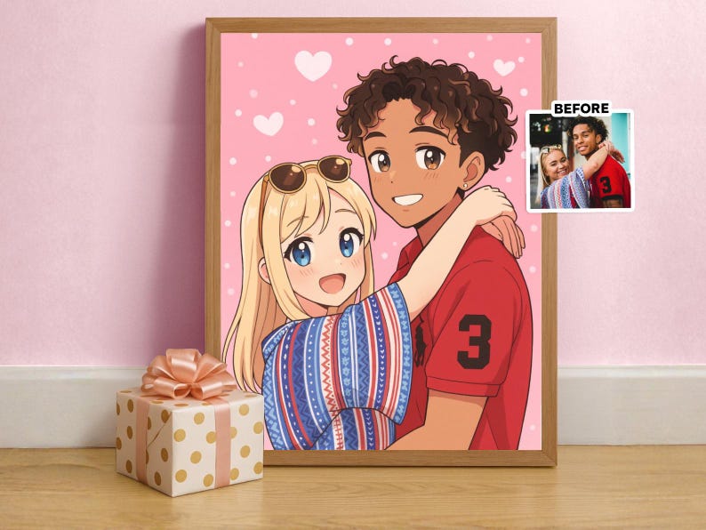 May include: A framed anime-style illustration of a couple embracing, set against a pink background with white hearts. The woman has blonde hair and sunglasses, wearing a patterned top. The man wears a red shirt with the number 3. A gift box with a bow is in the foreground.