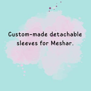 May include: A light blue background featuring a soft, watercolor-style purple splash in the center. Black text is printed over the splash, reading: Custom-made detachable sleeves for Meshar. The design includes small purple paint splatters above the text.