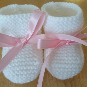 Hand Knitted Baby Booties: White Newborn Shoes with Pink Ribbon