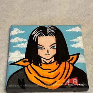 May include: A hand-painted canvas featuring a cartoon portrait of a character with black hair, a white headband, and an orange scarf. The character has blue eyes and a light skin tone. The background is a blue sky with white clouds. The character has a red "R" on their black shirt.
