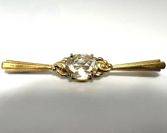 Antique Art Nouveau bar brooch, gilded with clear quartz, circa 1915–1930