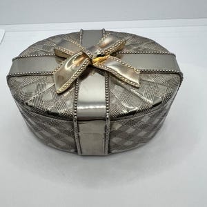 Vintage sieradendoosje met gouden strik
