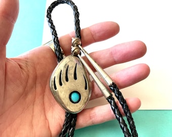 Vintage Navajo Sterling Silver and Turquoise Black Leather Bear Paw Bolo Tie