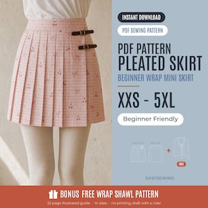 Op de afbeelding: Een roze geplooide minirok met een kersenpatroon op een ruitjesachtergrond. De rok heeft twee zwarte zijriemen met gespen. Tekst: INSTANT DOWNLOAD, PDF SEWING PATTERN, PDF PATTERN PLEATED SKIRT, BEGINNER WRAP MINI SKIRT, XXS - 5XL, Beginner Friendly, BONUS FREE WRAP SHAWL PATTERN, 22-page illustrated guide, 14 sizes, no printing, draft with a ruler, EASYSEWING.