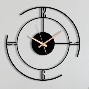 Reloj de pared de metal minimalista: decoración artística silenciosa y moderna