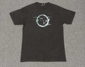 THE RING 2 ザ・リング2 ホラー映画 ©︎2005 Tシャツ【値下げ】 THE RING 2 ザ・リング2 ホラー映画 ©︎2005 Tシャツ【値下げ】 - メルカリ