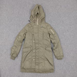 May include: An olive green hooded parka-style jacket with a quilted hood. The jacket features multiple pockets, a zipper closure, and button details. The sleeves have ribbed cuffs. The jacket is designed for cold weather and is made of a durable, water-resistant material.