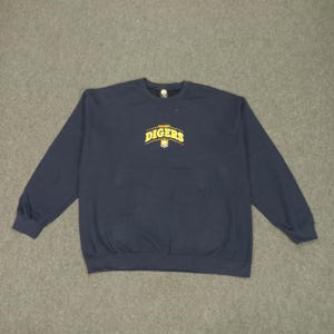 May include: A navy blue long-sleeved sweatshirt with a yellow graphic of the word "DIGGERS" in an arched design.