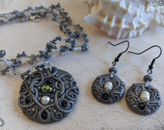 Dark Molten Polymer Silver Celtic Knot Pearl Crystal Pendant Necklace and Earrings Set