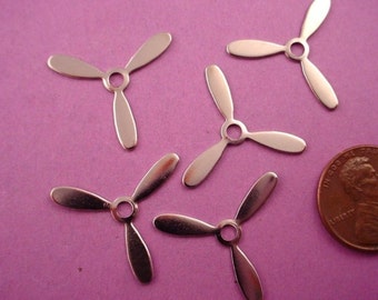 10 silver tone airplane aviation propellers 22mm wide retro