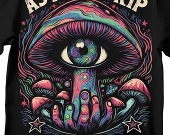 May include: A psychedelic illustration of a mushroom with an eye in the cap. The mushroom is surrounded by smaller mushrooms and a pair of hands reaching up from the bottom. The text "ASTRAL TRIP" is at the top of the image.