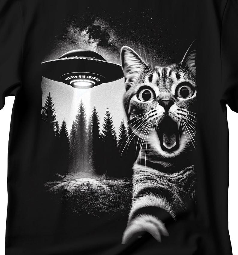 May include: A black and white illustration of a cat with a surprised expression, looking up at a UFO flying over a forest. The cat's mouth is open and its eyes are wide.