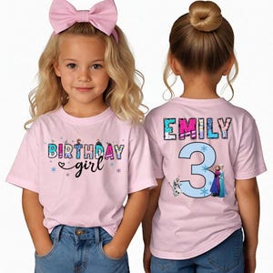 May include: Pink short-sleeved t-shirts with the text "BIRTHDAY girl" and "EMILY 3" in a colorful design. The shirts feature images of characters from a popular animated movie. The girl is wearing blue jeans.