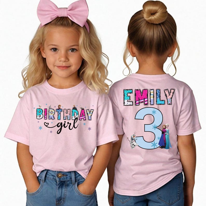 May include: Pink short-sleeved t-shirts with the text "BIRTHDAY girl" and "EMILY 3" in a colorful design. The shirts feature images of characters from a popular animated movie. The girl is wearing blue jeans.