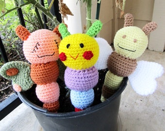 Handmade crochet 'Garden Bugs' baby rattle set: bee, butterfly & caterpillar. Soft-textured and colorful baby toys with bell