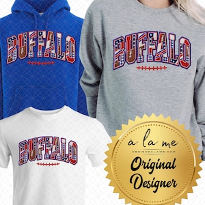 May include: A blue hoodie, a gray sweatshirt, and a white t-shirt, each featuring the word BUFFALO in a patchwork-style font with red, white, and blue patterns, including football textures and stars, with a red football lace graphic below.