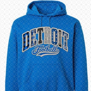 May include: A bright blue hooded sweatshirt featuring the word DETROIT in large, block-style letters with varied patterns including plaid, stars, and football textures, with the word Football written in a white cursive script underneath.