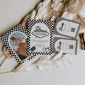 May include: Black and white checkered wedding invitation with a Las Vegas theme. The invitation features a welcome to Las Vegas sign with a red neon glow. The invitation also includes a RSVP card with a QR code.