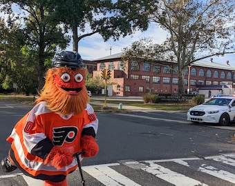 Gritty Running From Cops Art Print: Philadelphia Flyers Mascot
