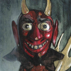 May include: A red devil puppet with a toothy grin, large eyes, and horns. The puppet is holding a wooden pitchfork.