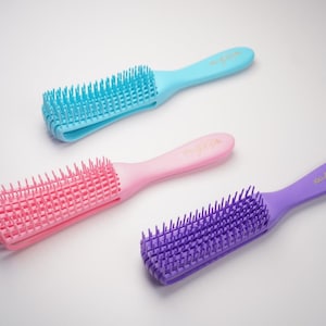 Length Retention Detangling Brush