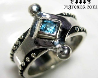 Unisex silver ring with Blue Topaz stones and Gothic .925 Sterling Studs in a Size 5