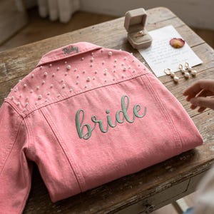 Personalized Coral Jean Jacket for Bride, Custom Embroidered Bride & Name on Collar, Pearl Denim Bridal Jacket, Wedding Day Mrs Jacket