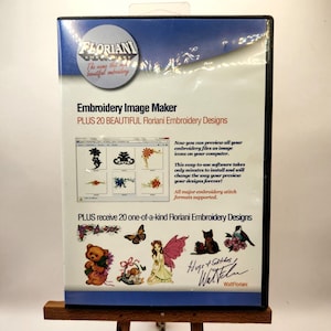 May include: A DVD case for "Embroidery Image Maker" software. The case features the Floriani logo and text describing the software's features, including previewing embroidery files and offering 20 designs. Colorful illustrations of designs are shown.