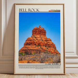 May include: Framed print featuring Bell Rock in Sedona, Arizona, under a clear blue sky. The image showcases the iconic red rock formation with a beige border and the text "BELL ROCK" at the top. Coordinates are listed at the bottom.