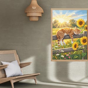May include: A framed wall art print featuring an orange tabby cat sleeping on a wooden fence in a field of sunflowers under a bright sun. The artwork displays vibrant yellow, green, and orange tones, capturing a peaceful outdoor scene.