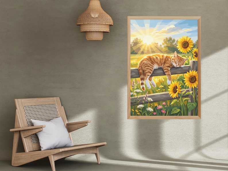 May include: A framed wall art print featuring an orange tabby cat sleeping on a wooden fence in a field of sunflowers under a bright sun. The artwork displays vibrant yellow, green, and orange tones, capturing a peaceful outdoor scene.