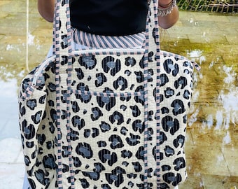 Leopard Print Duffle Bag, Quilted Leopard Duffle, Animal Print Travel Bag, Stylish Leopard Duffle, Leopard Overnight Bag.
