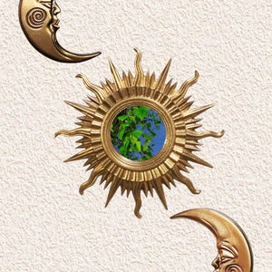May include: Gold-coloured celestial wall decor featuring a sunburst mirror with a blue sky and green foliage reflection, flanked by two crescent moons with faces. The pieces are set against a textured, off-white background.