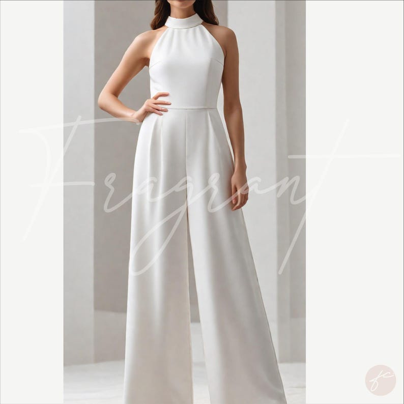 May include: A white sleeveless jumpsuit with a high neck and wide legs. The jumpsuit is made of a smooth, flowing fabric.