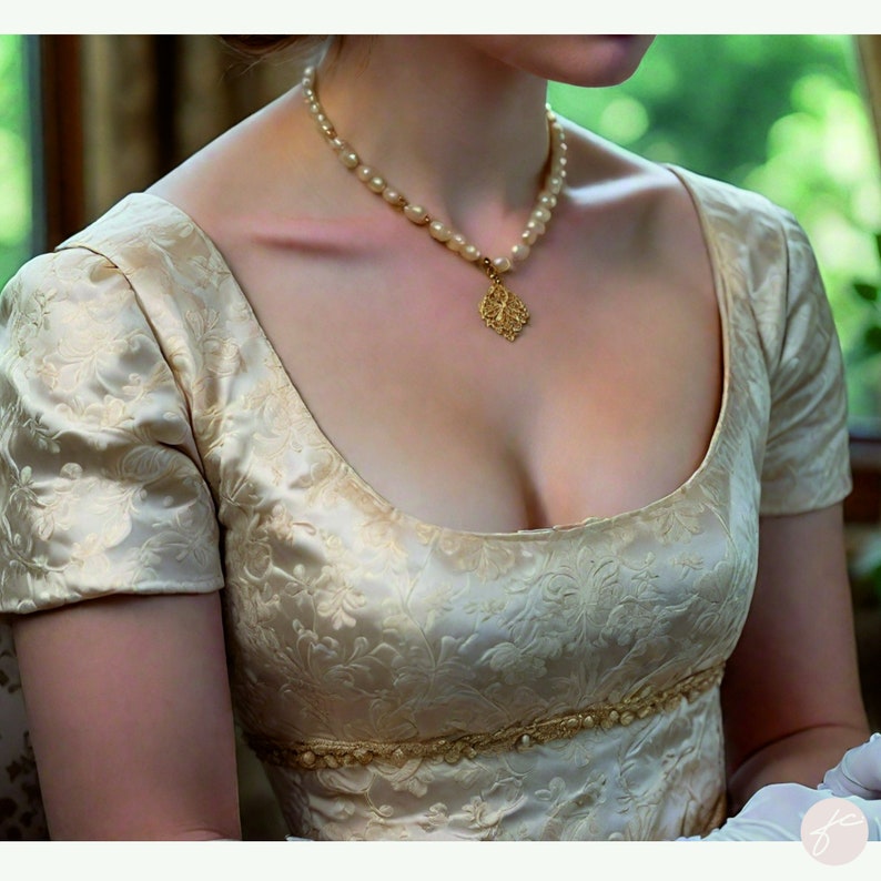 May include: A woman wearing a cream-colored satin dress with a floral pattern. The dress has a scoop neckline and short sleeves. She is wearing a pearl necklace with a gold pendant.