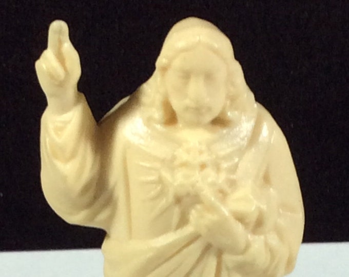 Plastic Dashboard Jesus, Sacred Heart Auto League, Southern Mission