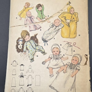 May include: Vintage baby layette sewing pattern. The pattern features illustrations of baby clothing designs, including dresses, rompers, and a hooded coat. The pattern is labeled "Layette" and is in one size only. The pattern is from the brand "Butterick".