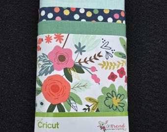 On Trend Designer Fabric Sampler From Cricut, Samples Of White Main, Navy Hexie Dot, Bottle Green, Alpine, and Coral Quatrefoil