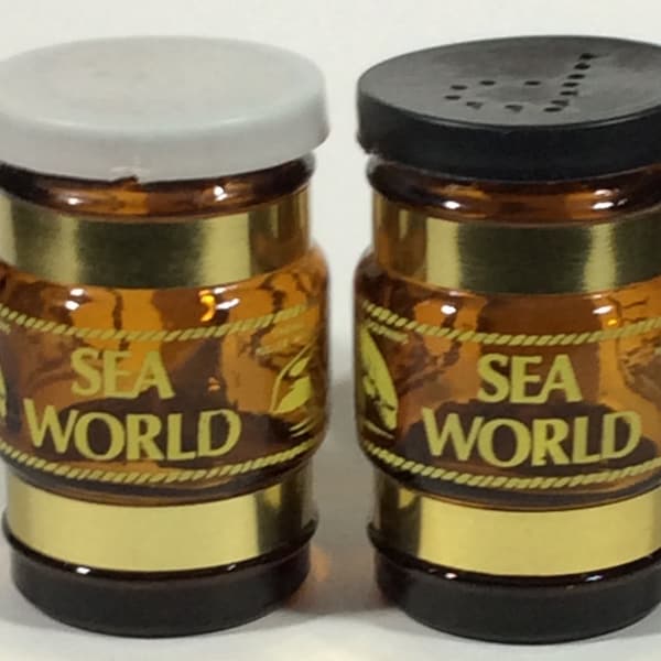 Vintage Souvenir Sea World Amber Glass Stein Like Salt And Pepper Shakers, 70's, Shamu Killer Whale, Dolphins, Wood Handles