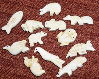 12 Carved bone fetish animals made in The Philipines