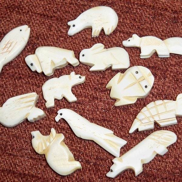 12 Carved bone fetish animals made in The Philipines