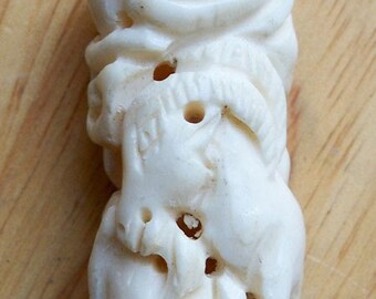 Large Carved Bone Animal Design Bead