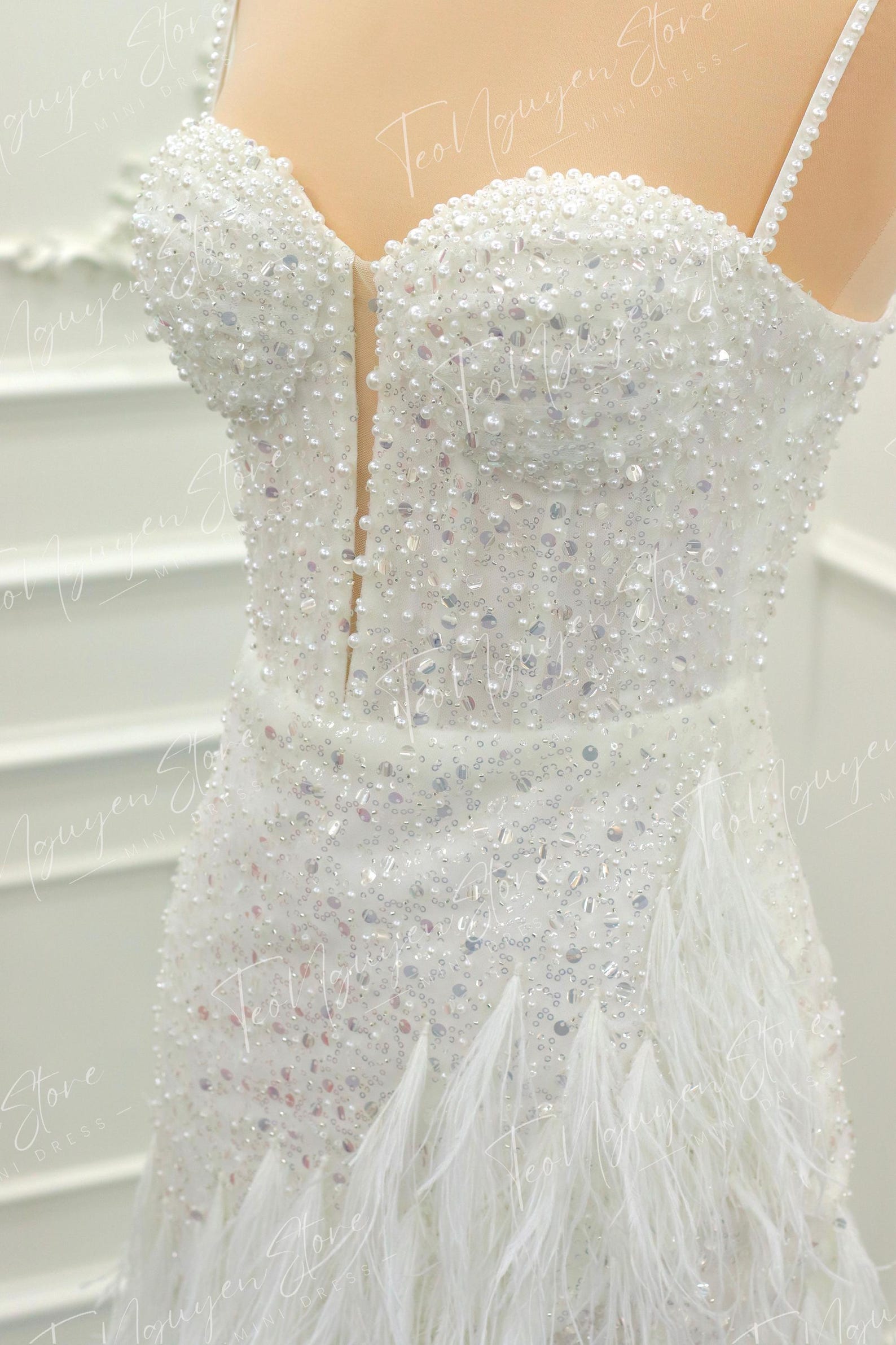 Elegant Sparkle Feather Detail Mini Dress