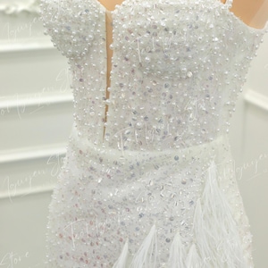Enchanting Black Fitted Short Dress with Beaded Bodice and Faux Feather Skirt main image 1
