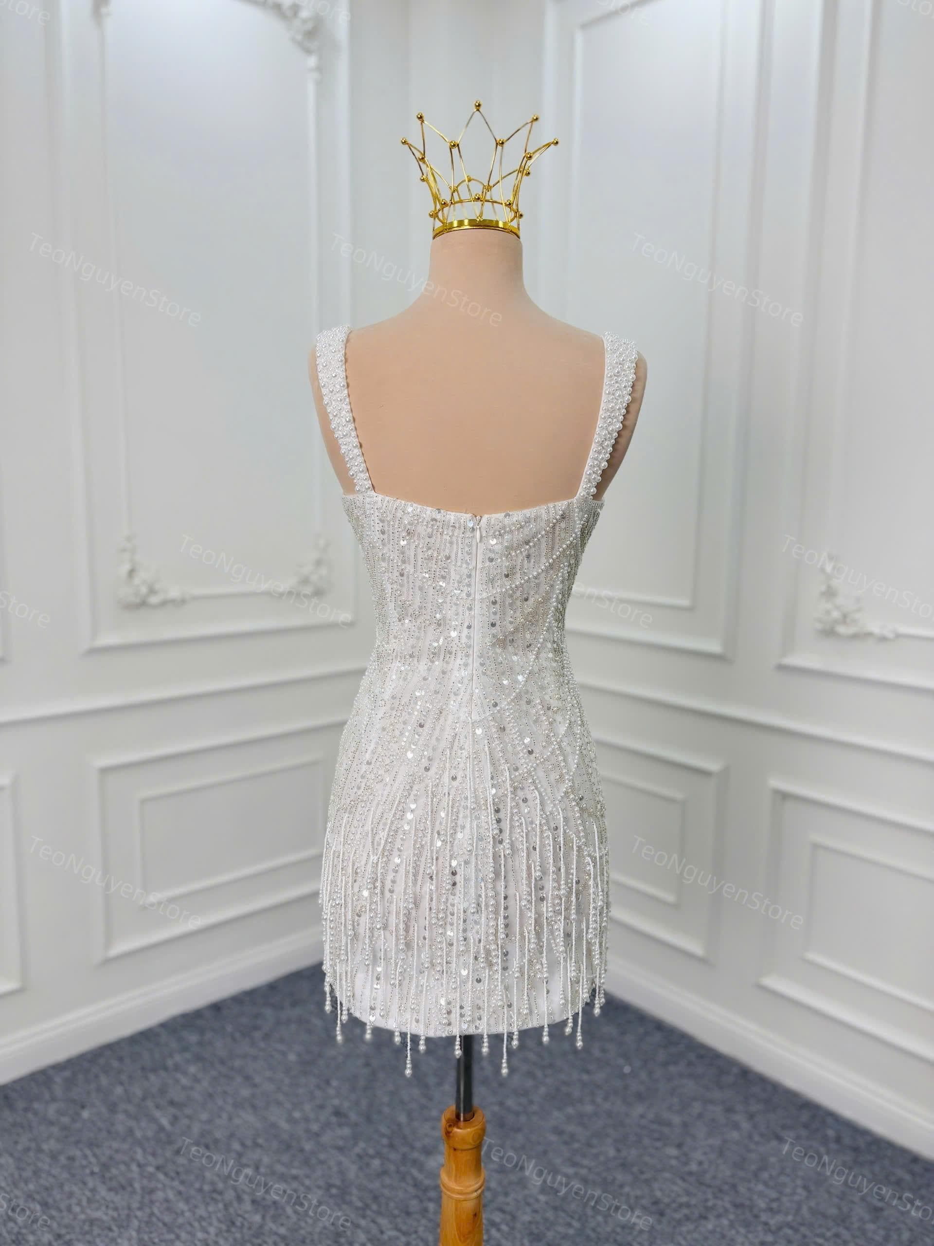 white beaded mini dress with shoulder straps. reception dress. Custom short wedding dress according to bride's request beaded mesh with a dimensional finish Luvia Beaded Mini Dress -