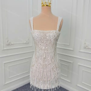 Beaded mini dress with shoulder straps. White reception dress. Custom short wedding dress according to bride&#39;s request.