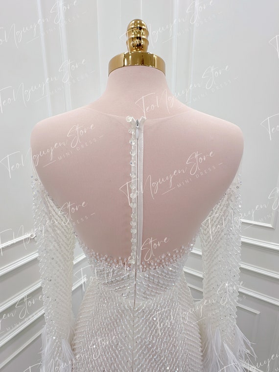short beaded wedding dress. Mini wedding dress with beads and feathers. Luxurious short dress. Custom short wedding dresses.