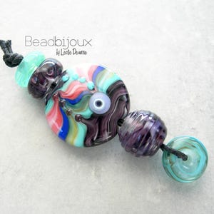 Glass Focal Bead Set in Teal Turquoise Violet Purple Blue and Pink - Handmade SRA Artisan Lampwork Beads by Leslie Deaunne